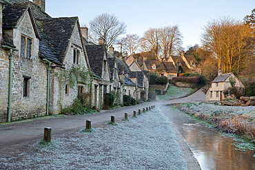 Arlington Row Cotswold stone cottages on frosty morning, Bibury, Cotswolds, Gloucestershire, England, United Kingdom, Europe