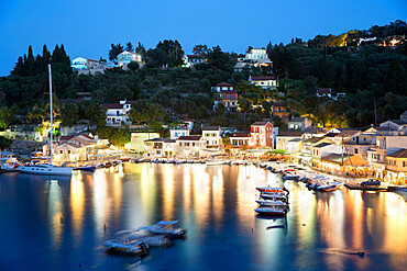 View over harbour at night, Loggos, Paxos, Ionian Islands, Greek Islands, Greece, Europe