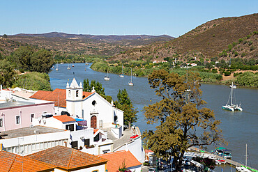 View over whitewashed village of Alcoutim on Rio Guadiana river, Alcoutim, Algarve, Portugal, Europe