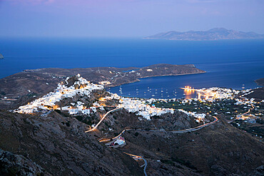 View over Livadi Bay and hilltop town of Pano Chora at night, Serifos, Cyclades, Aegean Sea, Greek Islands, Greece, Europe