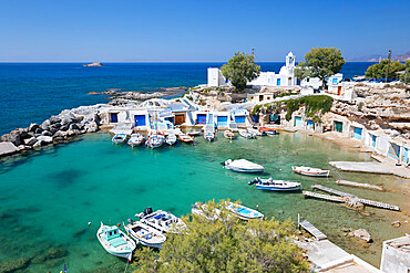 View over fishing harbour with boats and colourful boat houses, Mandrakia, Milos, Cyclades, Aegean Sea, Greek Islands, Greece, Europe