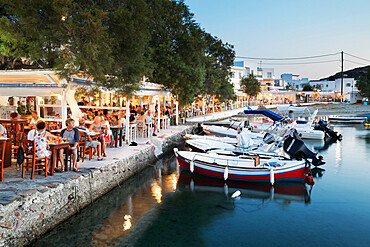 Harbour restaurants in evening, Pollonia, Milos, Cyclades, Aegean Sea, Greek Islands, Greece, Europe