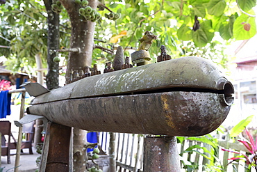 Casing of American cluster bomb on display, Muang Ngoi Neua, Luang Prabang Province, Northern Laos, Laos, Indochina, Southeast Asia, Asia