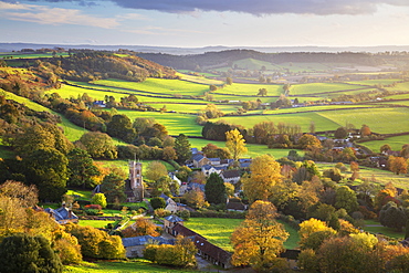 View in autumn over the village of Corton Denham and countryside at sunset, Corton Denham, Somerset, England, United Kingdom, Europe