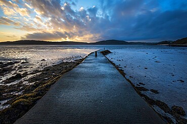 Pier at low tide at sunset, Rockcliffe, Dalbeattie, Dumfries and Galloway, Scotland, United Kingdom, Europe