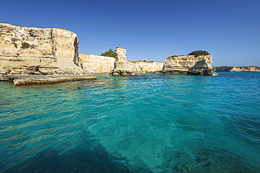 Rock stacks and crystal clear sea of the Faraglioni di Sant Andrea, Torre di Sant Andrea, Melendugno, Lecce Province, Puglia, Italy, Europe