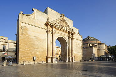 Porta Napoli and the Santa Maria di Porta church in afternoon sunlight, Lecce, Puglia, Italy, Europe