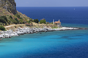 Chapel on headland with turquoise water, Limeni, Mani, Peloponnese, Greece, Europe