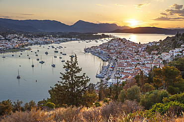 View over Poros town at sunset, Poros, Saronic islands, Greek Islands, Greece, Europe