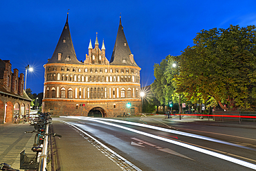 Holsten Tower floodlit at night, Lubeck, Schleswig Holstein, Germany, Europe