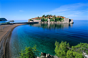 View of island and beach, Sveti Stefan, The Budva Riviera, Montenegro, Europe