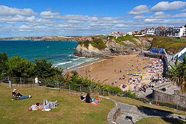 People relaxing in park above Towan beach, Newquay, Cornwall, England, United Kingdom, Europe