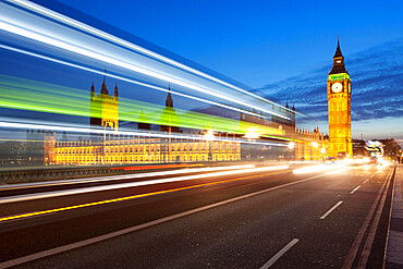 Motion blurred bus on Westminster Bridge and Houses of Parliament, London, England, United Kingdom, Europe