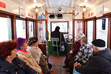 Passengers in elevador (funicular) do Gloria, Bairro Alto, Lisbon, Portugal, Europe