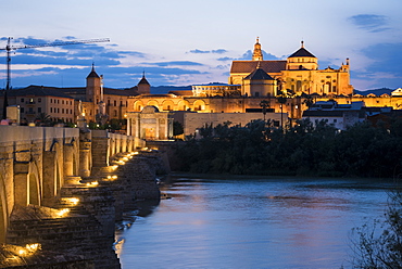 The Cathedral and Great Mosque of Cordoba (Mezquita) and Roman Bridge at twilight, UNESCO World Heritage Site, Cordoba, Andalucia, Spain, Europe