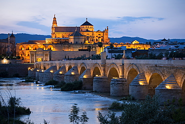 The Cathedral and Great Mosque of Cordoba (Mezquita) and Roman Bridge at twilight, UNESCO World Heritage Site, Cordoba, Andalucia, Spain, Europe