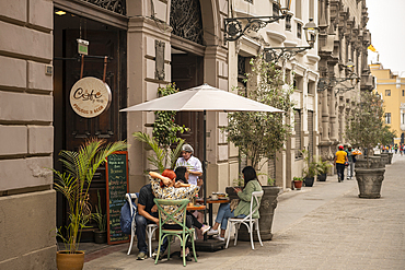 People sitting outside cafe, Lima, Peru, South America