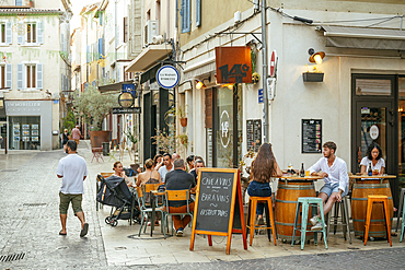 People sitting outside wine bar, La Ciotat, Bouches-du-Rhone, Provence Alpes Cote d'Azur, France.