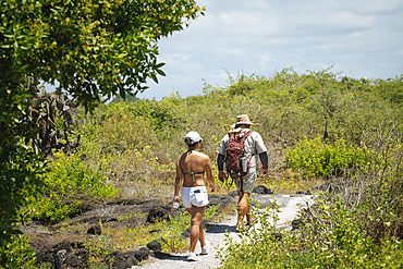 Guide with hiker, Isla Isabela, Galapagos Islands, Ecuador