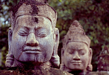 Carved stone statues aligned at South Gate to Angkor Thom, Angkor, UNESCO World Heritage Site, Cambodia, Southeast Asia, Asia