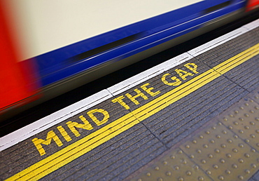 MIND THE GAP sign on platform edge, London Underground, London, England, United Kingdom, Europe 