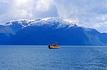 Ship wreck "KapitÃ¤n Leonidas" in a Chilean Fjords secenery. Canal Mesier, Southern Chile