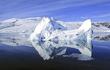 Drifting iceberg in RØdefjord . Scoresbysund, East Greenland