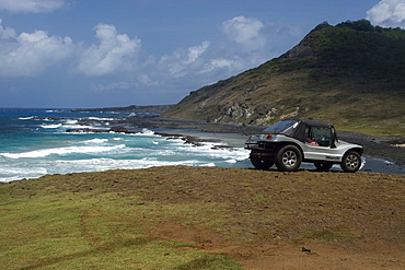 Local Gurgel buggy overlooking Enseada da Caieira,  Fernando de Noronha, Pernambuco, Brazil, South America