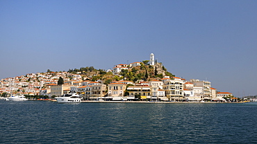 Poros town and harbour viewed from the sea, Poros island, Attica, Peloponnese, Greece, Europe