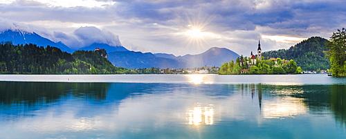 Lake Bled at sunrise with the Church on Lake Bled Island and Bled Castle, Gorenjska Region, Slovenia, Europe