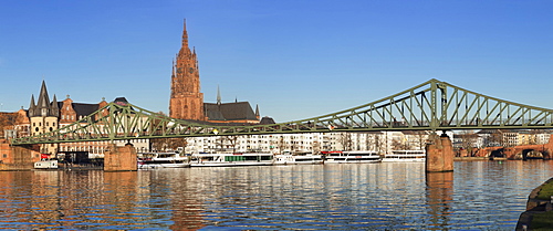 View over Main River to Eiserner Steg iron footbridge and Kaiserdom Cathedral of St. Bartholomew, Frankfurt, Hesse, Germany, Europe