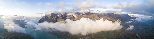 Panoramic of Piz Arlas, Cambrena, Caral at dawn Bernina Pass, Poschiavo Valley, Engadine, Canton of Graubunden, Switzerland, Europe (Drone)