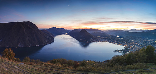 Panoramic of Lake Lugano at sunset from Monte Bre, Canton of Ticino, Switzerland, Europe