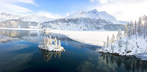 Aerial panoramic view of Lake Sils and Plaun da Lej during winter, Maloja Region, Canton of Graubunden, Engadine, Switzerland, Europe (Drone)