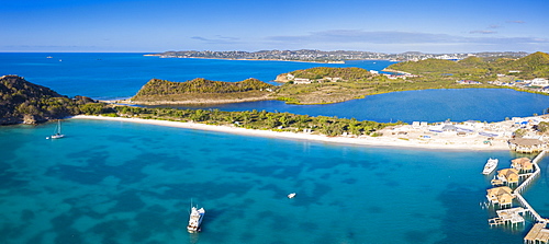 Aerial panoramic by drone of the blue Caribbean Sea and white sand beach, Deep Bay, Antigua, Leeward Islands, West Indies, Caribbean, Central America