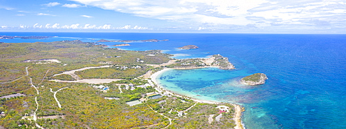 Aerial panoramic by drone of Caribbean Sea surrounding Exchange Bay, Antigua, Leeward Islands, West Indies, Caribbean, Central America