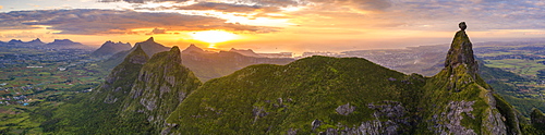 Aerial panoramic of sunset over Le Pouce and Pieter Both mountains, Moka Range, Port Louis, Mauritius, Africa