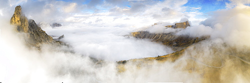 Aerial view by drone of fog over Ra Gusela and Lastoi De Formin in autumn, Giau Pass, Dolomites, Belluno province, Veneto, Italy, Europe