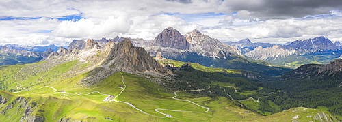 Aerial panoramic of Giau Pass, Ra Gusela, Nuvolau, Averau and Tofane mountains in summer, Dolomites, Veneto, Italy, Europe