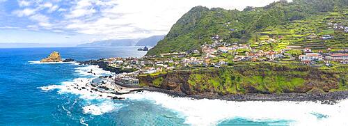 Aerial panoramic view of the seaside town and natural pools of Porto Moniz, Madeira island, Portugal, Atlantic, Europe