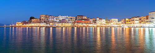 Panoramic of the illuminated old town and Venetian harbour of Chania at dusk, Crete, Greek Islands, Greece, Europe