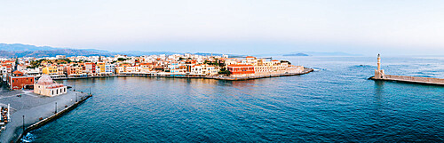 Panoramic of the old Venetian harbour and lighthouse of Chania at sunrise, aerial view, Crete, Greek Islands, Greece, Europe