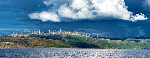 Wind turbines under a stormy sky, Troms county, Norway, Scandinavia, Europe