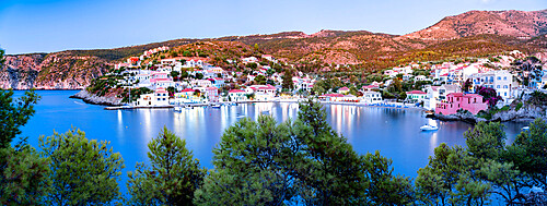 Multicolored houses in the fishing village of Assos at dusk, Kefalonia, Ionian Islands, Greek Islands, Greece, Europe