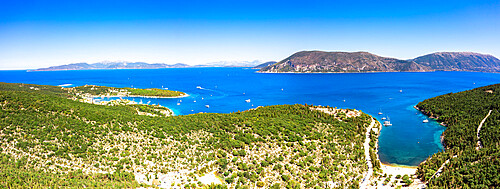 Aerial view of green woods surrounding the blue sea at the idyllic Foki beach, Fiskardo, Kefalonia, Ionian Islands, Greek Islands, Greece, Europe