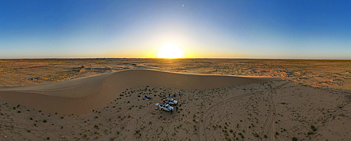 Aerial of sunset over a beautiful sand dune in the Tibesti Mountains, Chad, Africa