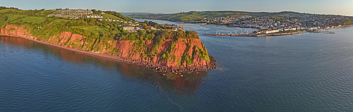 A panoramic view across the Ness headland to the mouth of the River Teign and the harbour and tourist resort of Teignmouth, on the south coast of Devon, England, United Kingdom, Europe