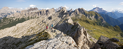 Hiking in typical mountainous terrain of the Dolomites range of the Alps on the Alta Via 1 trekking route near Rifugio Nuvolau, Belluno, Veneto, Italy, Europe