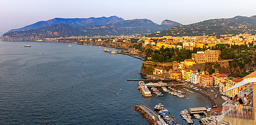 Tourists dining with panoramic view of Sorrento, Bay of Naples, Campania, Italy, Mediterranean, Europe