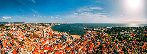 Aerial drone panoramic view of Cascais historic centre with the iconic Bay and Ribeira Beach, 30km west of Lisbon on the Portuguese Riviera, Cascais, Portugal, Europe